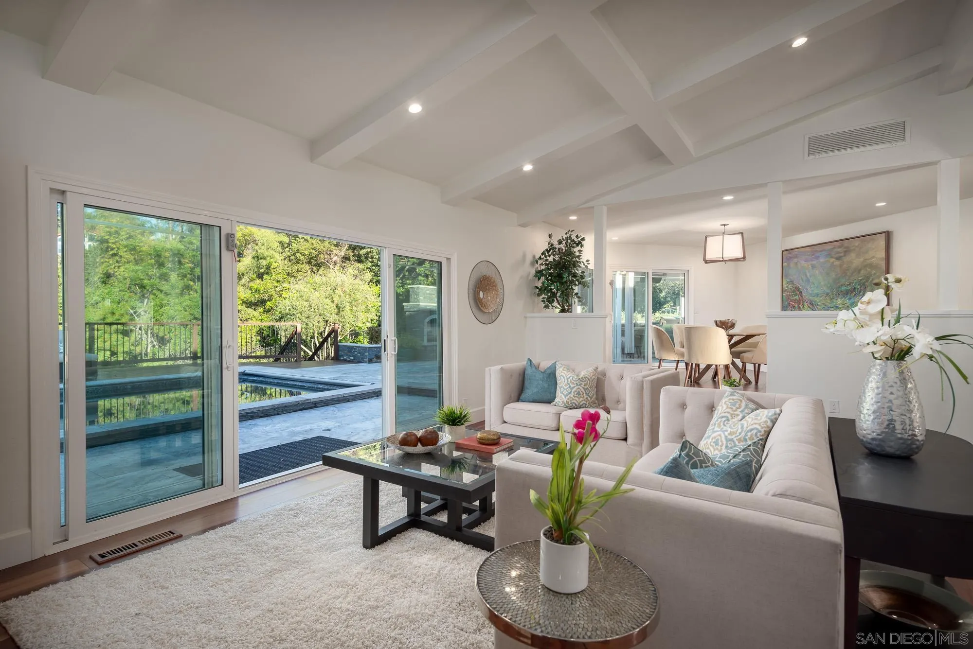 13384 Fallen Leaf Road Poway, CA 92064 - Photo 6 of 27 a living room with furniture and a floor to ceiling window