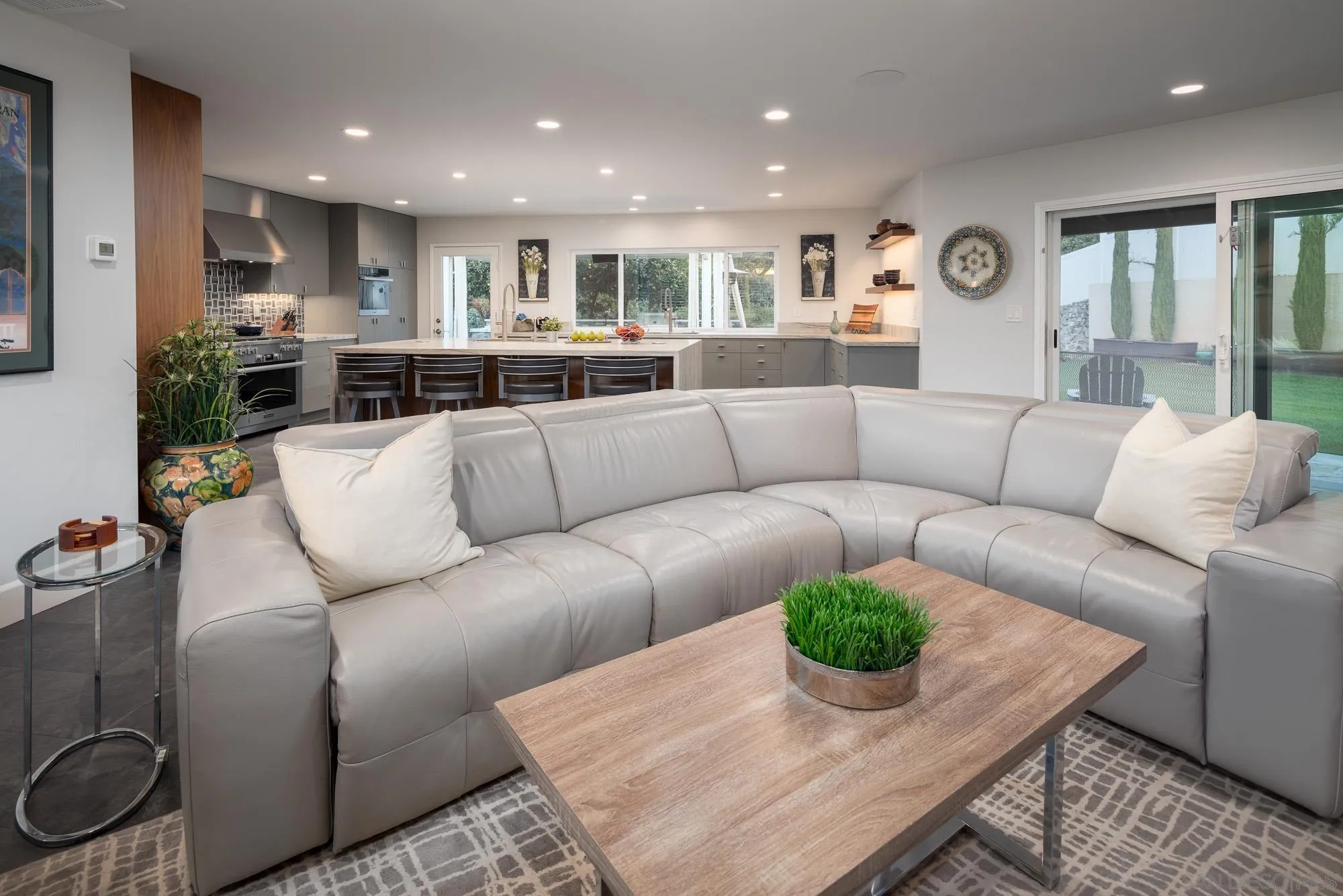 13384 Fallen Leaf Road Poway, CA 92064 - Photo 10 of 27 a living room with furniture kitchen and a table