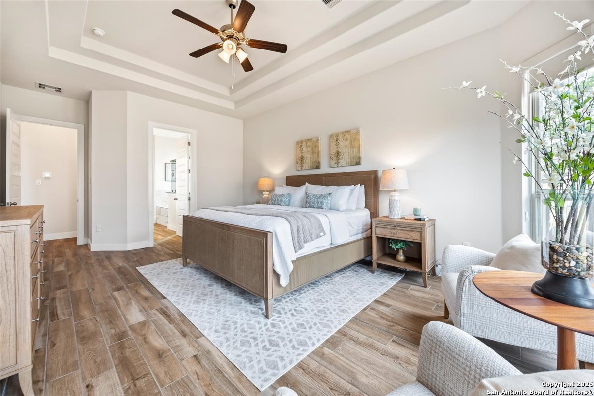 419 Heidelberg Road New Braunfels, TX 78132 - Photo 30 of 62 a bedroom with a bed and a couch