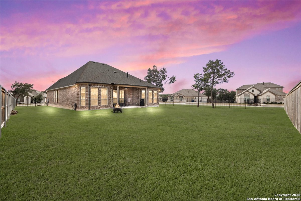 419 Heidelberg Road New Braunfels, TX 78132 - Photo 41 of 62 a front view of a house with garden