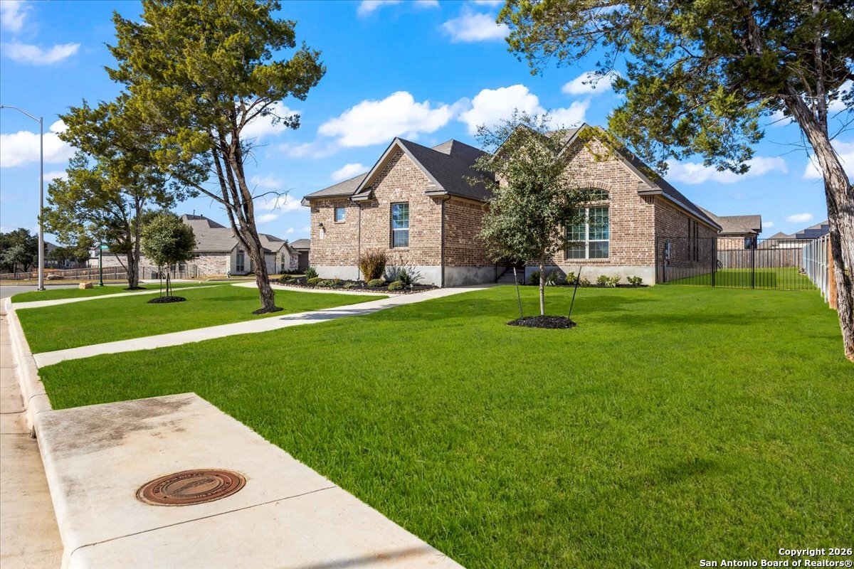 419 Heidelberg Road New Braunfels, TX 78132 - Photo 44 of 62 a view of a house with a backyard