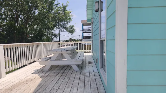 a view of a kitchen from the hallway