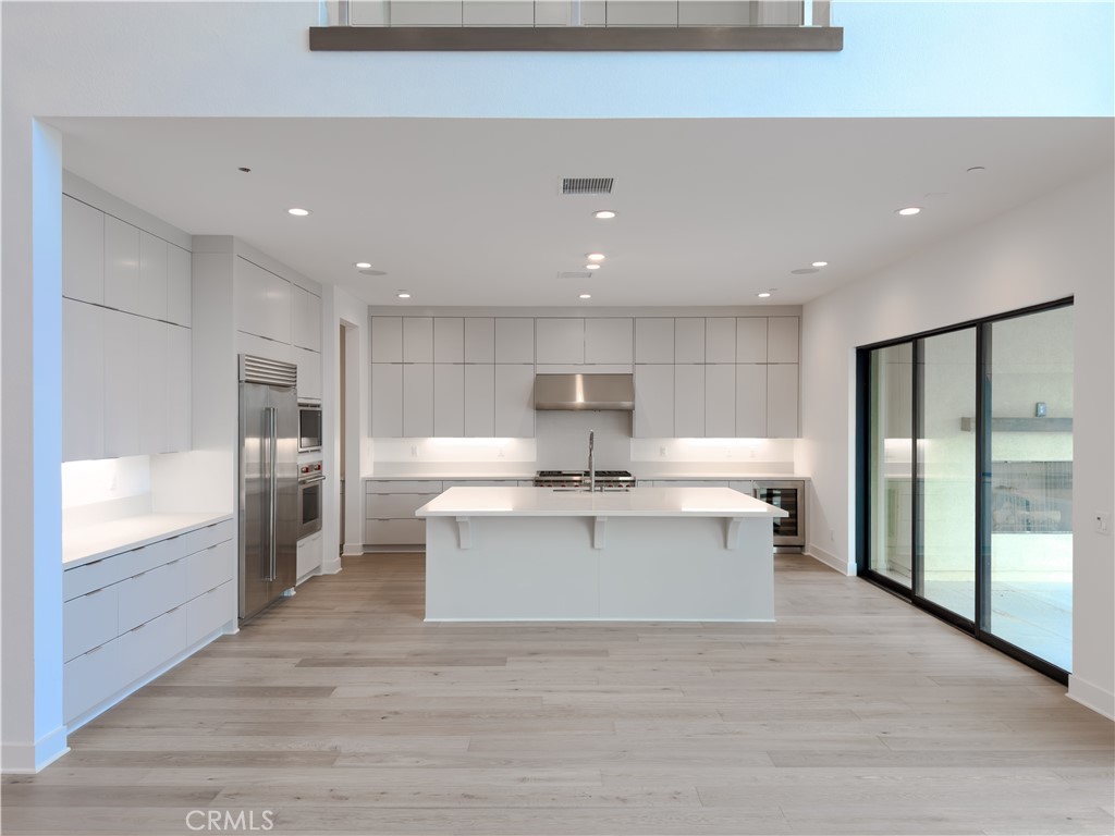 20138 Marlow Lane Porter Ranch, CA 91326 - Photo 15 of 36 a kitchen with a sink stainless steel appliances and counter space