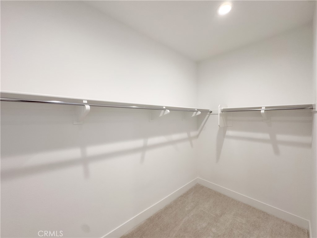 20138 Marlow Lane Porter Ranch, CA 91326 - Photo 18 of 32 a view of an empty walk in closet