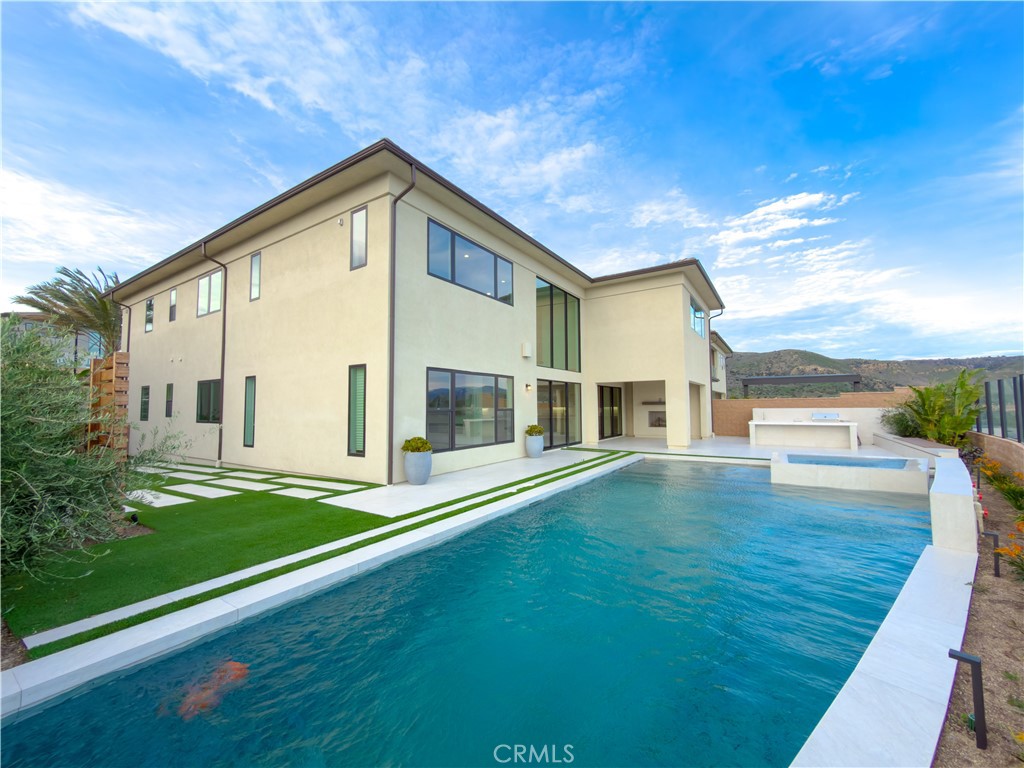 20138 Marlow Lane Porter Ranch, CA 91326 - Photo 2 of 36 a front view of a house with a yard