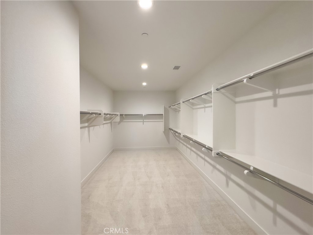 20138 Marlow Lane Porter Ranch, CA 91326 - Photo 22 of 32 a view of a room with racks on the wall