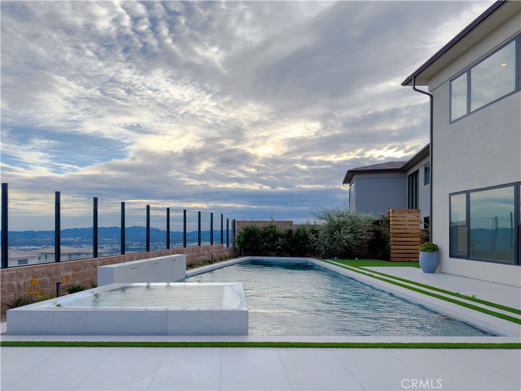 20138 Marlow Lane Porter Ranch, CA 91326 - Photo 3 of 36 a view of swimming pool with a yard