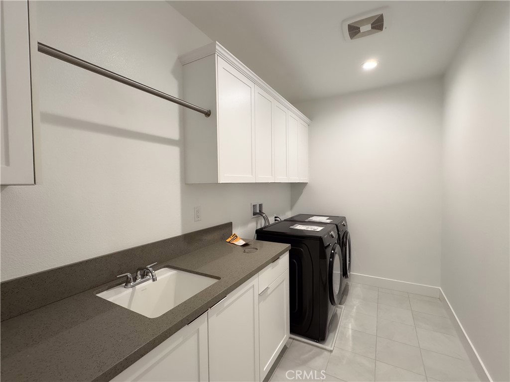 20138 Marlow Lane Porter Ranch, CA 91326 - Photo 32 of 32 a view of a storage and utility room with a sink