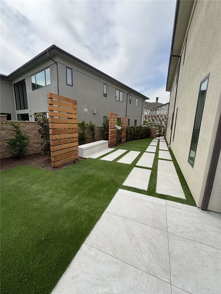 20138 Marlow Lane Porter Ranch, CA 91326 - Photo 5 of 32 a front view of a house with a yard