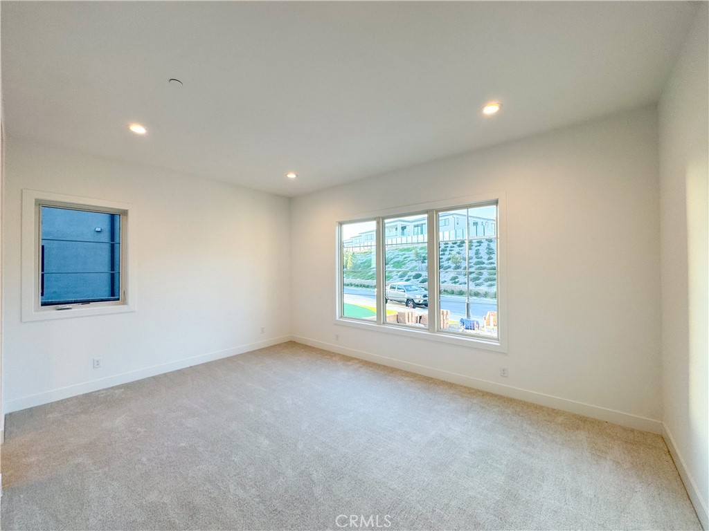 20138 Marlow Lane Porter Ranch, CA 91326 - Photo 9 of 32 an empty room with windows