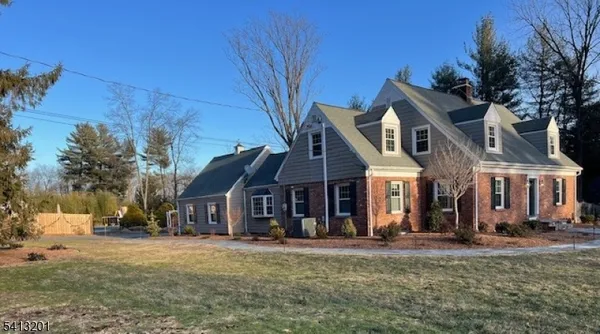 a view of a swimming pool with a yard