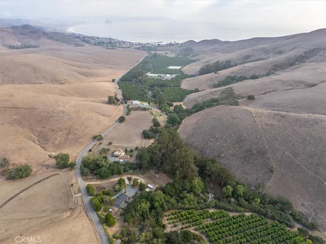 a view of a house with a big yard
