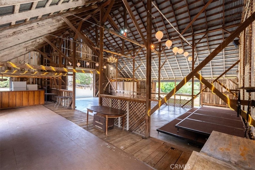 1155 Cayucos Creek Road Cayucos, CA 93430 - Photo 38 of 75 a backyard of a house with wooden stairs and table