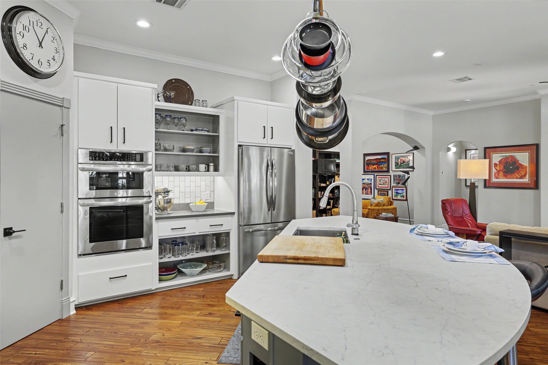 805 Boquilla Trail Georgetown, TX 78633 - Photo 17 of 40 a view of a kitchen with fridge and wooden floor