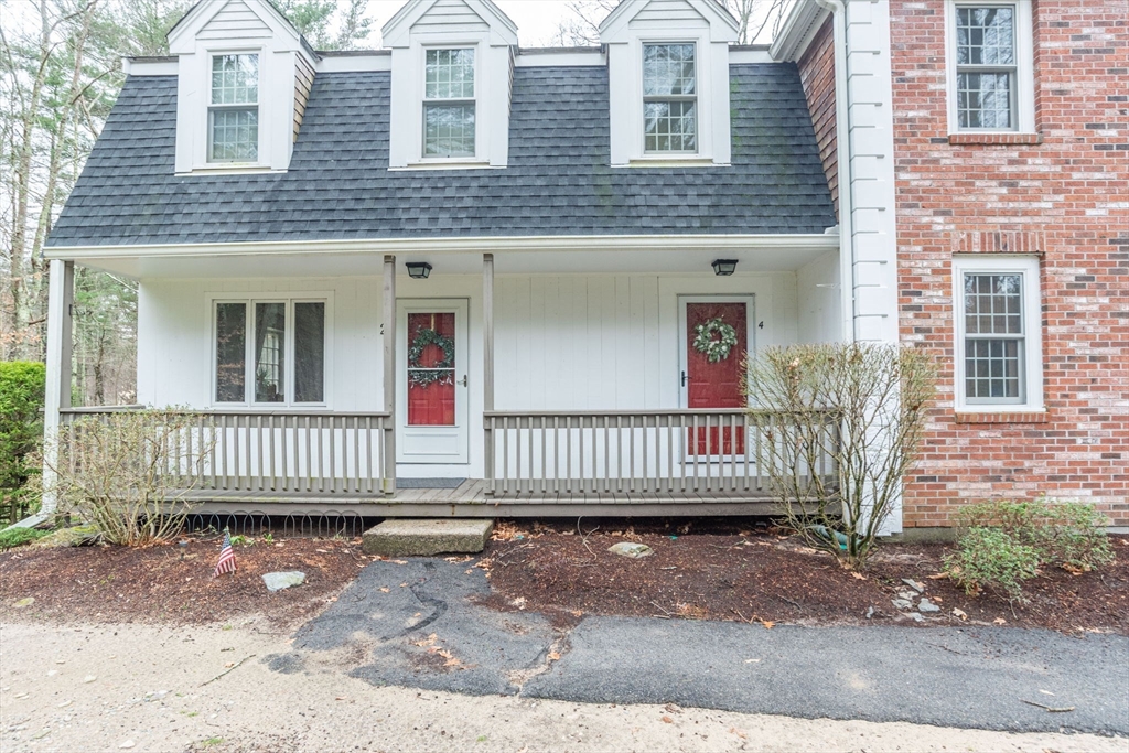 4 Colonial Drive, Unit 4 Norton, MA 02766 - Photo 1 of 34 front view of a house