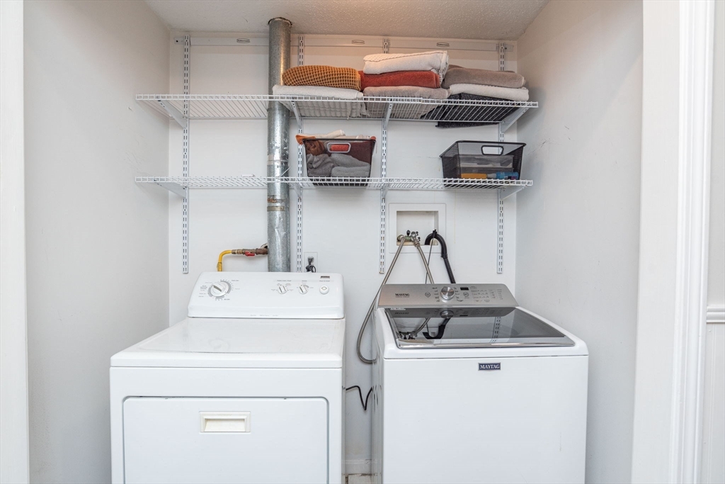 4 Colonial Drive, Unit 4 Norton, MA 02766 - Photo 34 of 34 a utility room with dryer and washer