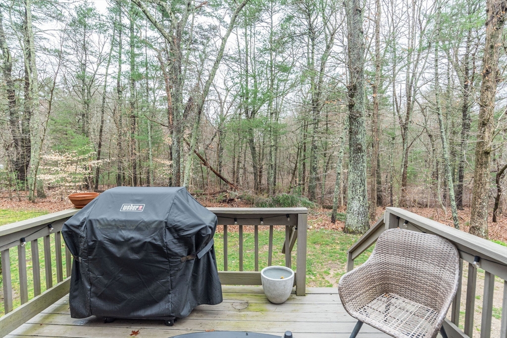 4 Colonial Drive, Unit 4 Norton, MA 02766 - Photo 6 of 34 a view of balcony with two chairs and wooden floor