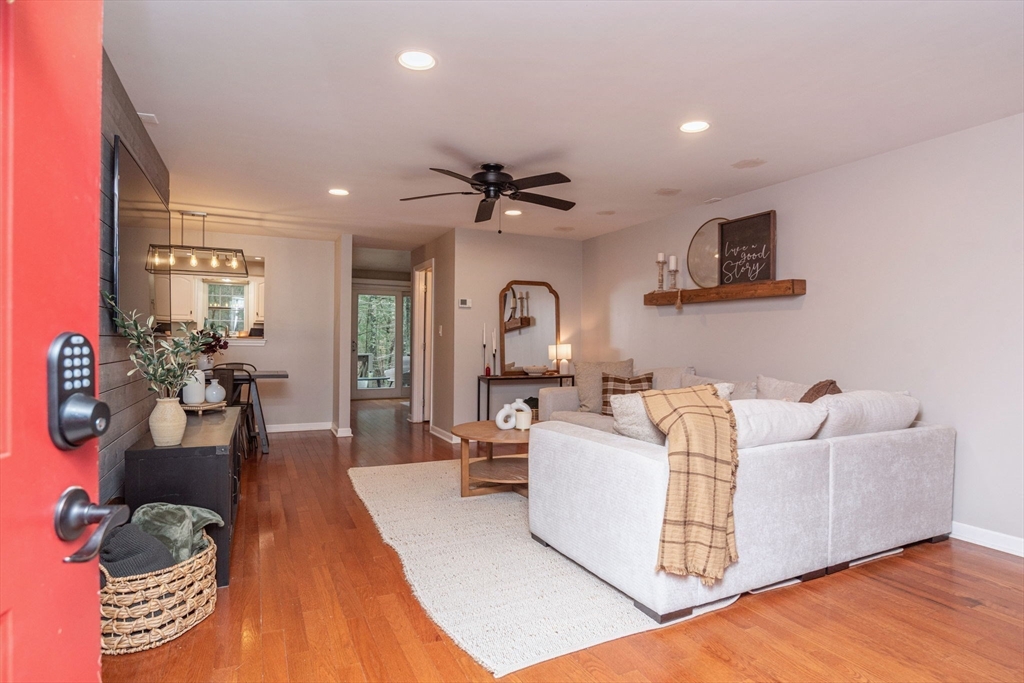4 Colonial Drive, Unit 4 Norton, MA 02766 - Photo 8 of 34 a living room with furniture and wooden floor