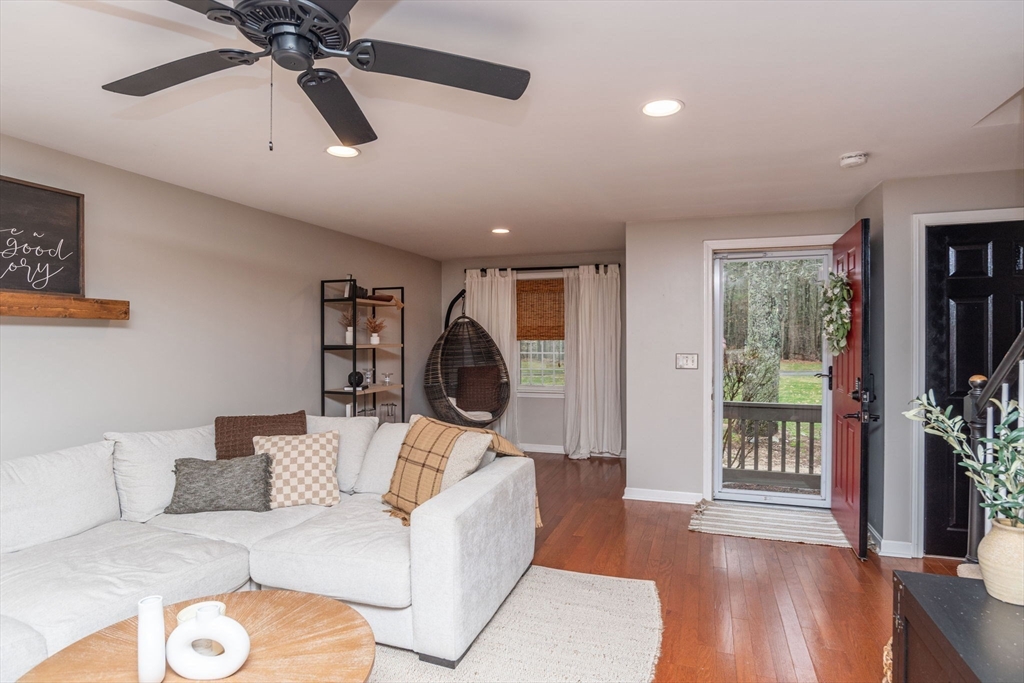 4 Colonial Drive, Unit 4 Norton, MA 02766 - Photo 10 of 34 a living room with furniture and a large window