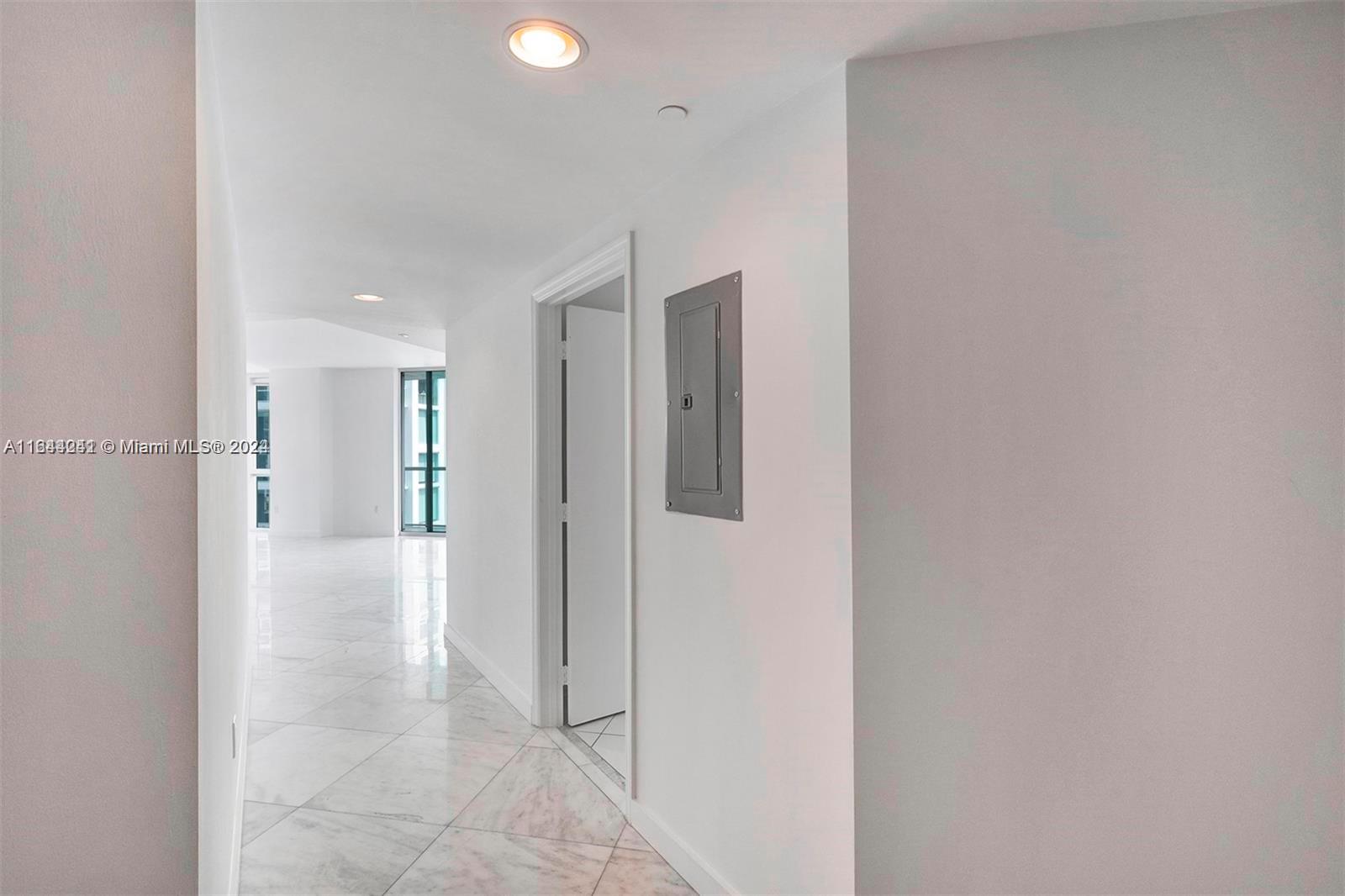 55 Southeast 6th Street, Unit 3401 Miami, FL 33131 - Photo 14 of 19 a view of a hallway