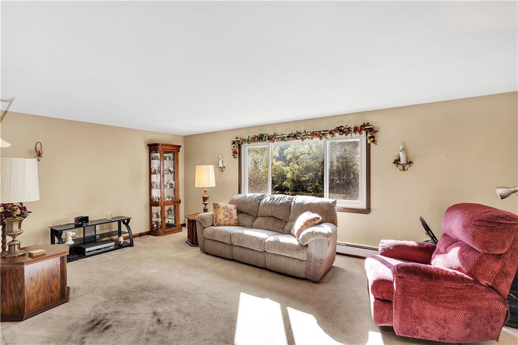 5986 Italy Road Export, PA 15632 - Photo 11 of 21 Spacious Living Room with Two Sets of Triple Windows. Windows are Approximately 10 Years Old!