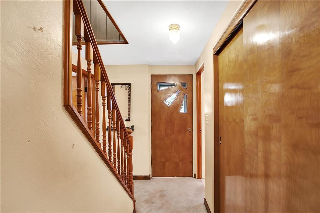 5986 Italy Road Export, PA 15632 - Photo 13 of 21 Original Side Door Entry and Hallway with Large Coat Closet.