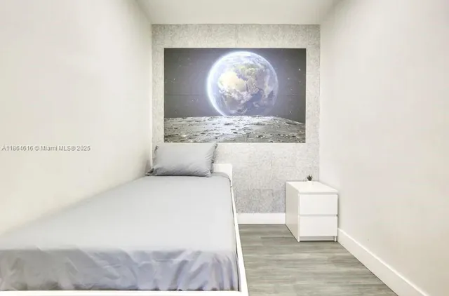 a view of fireplace with wooden floor