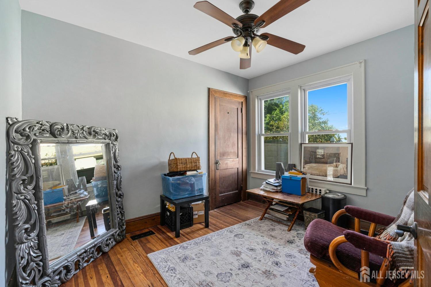 23 Reed Street Edison, NJ 08817 - Photo 20 of 27 a living room with furniture and a large window