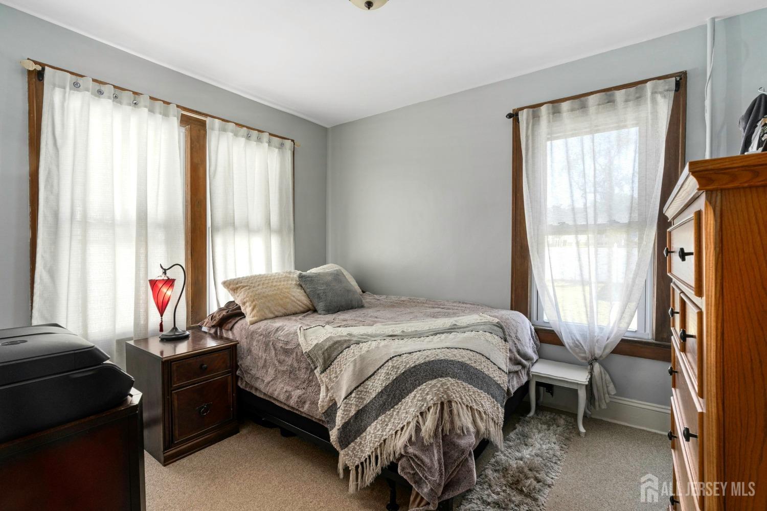 23 Reed Street Edison, NJ 08817 - Photo 21 of 27 a bedroom with a bed and a window