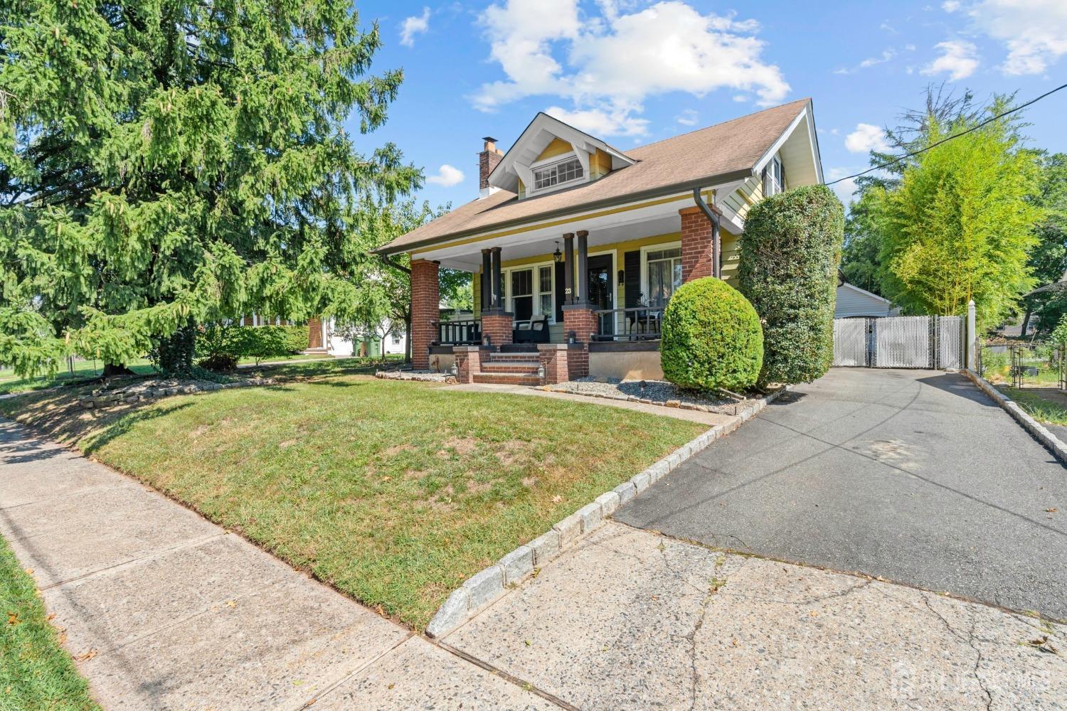 23 Reed Street Edison, NJ 08817 - Photo 3 of 27 front view of a house with a yard