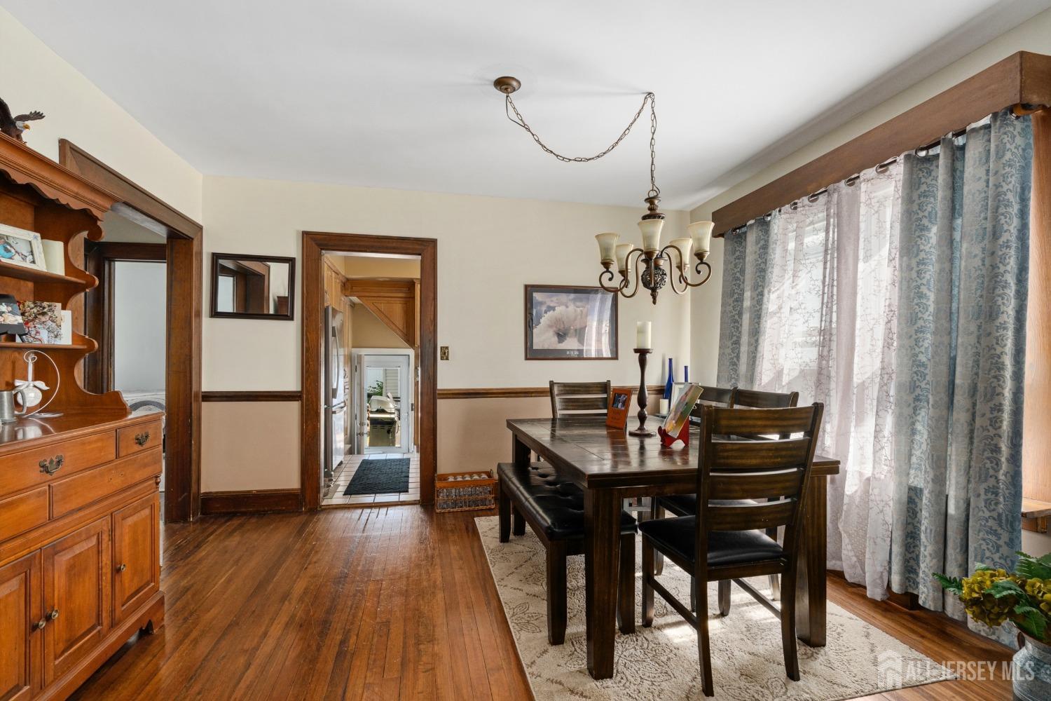 23 Reed Street Edison, NJ 08817 - Photo 7 of 27 a view of a dining room with furniture window and wooden floor