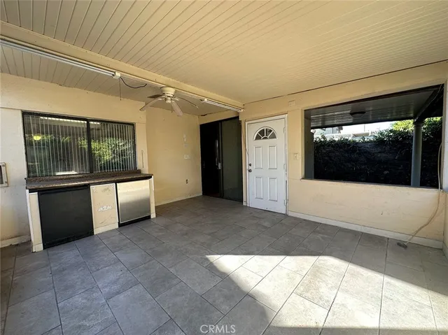 a view of a hallway with a large window