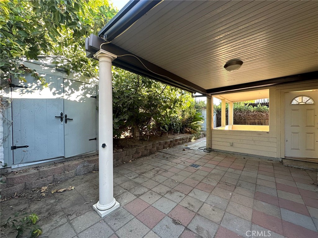 11052 Hastings Court Rancho Cucamonga, CA 91730 - Photo 13 of 14 a view of a porch with a table and chairs