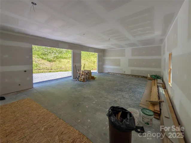 a view of empty room with front door