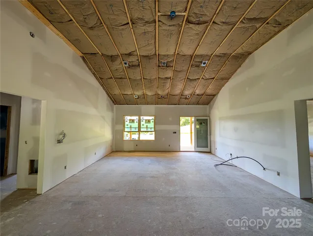 a view of a room with a windows