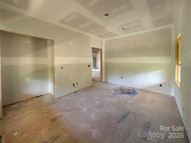 a view of a room with an empty space
