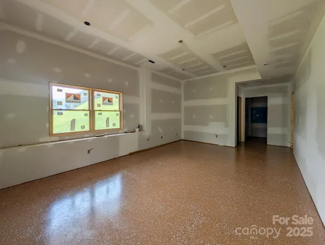 an empty room with windows