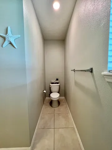 a bathroom with a toilet