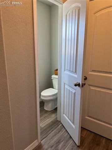 11066 Avena Road Peyton, CO 80831 - Photo 9 of 25 Half bath on the main level