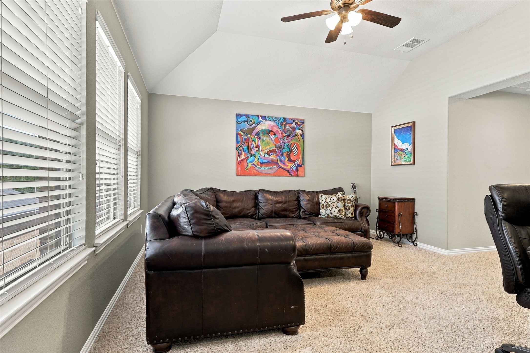 320 Fort Cobb Way Georgetown, TX 78628 - Photo 20 of 37 High vaulted ceilings and tall windows enhance this comfortable living space.