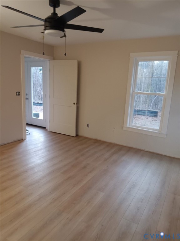 320 Vogel Road Cumberland, VA 23040 - Photo 8 of 20 Unfurnished room with light wood-style flooring an