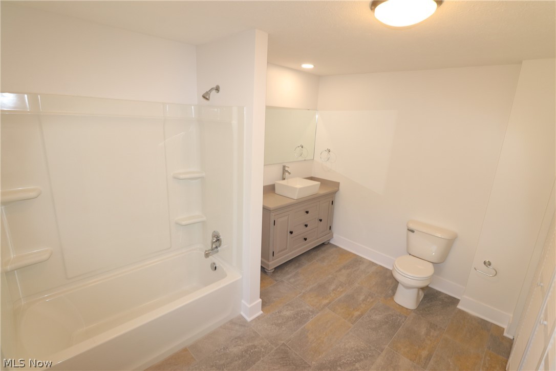 38 South State Street Rittman, OH 44270 - Photo 10 of 17 Second floor full bathroom remodeled with ceramic tile flooring.