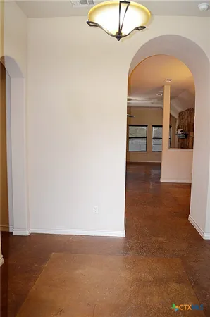a view of livingroom with hardwood floor and hallway