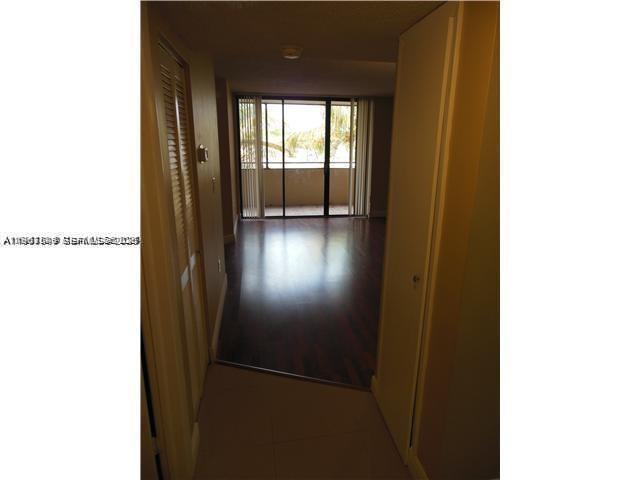 8335 Southwest 152nd Avenue, Unit B308 Miami, FL 33193 - Photo 5 of 9 a view of a hallway