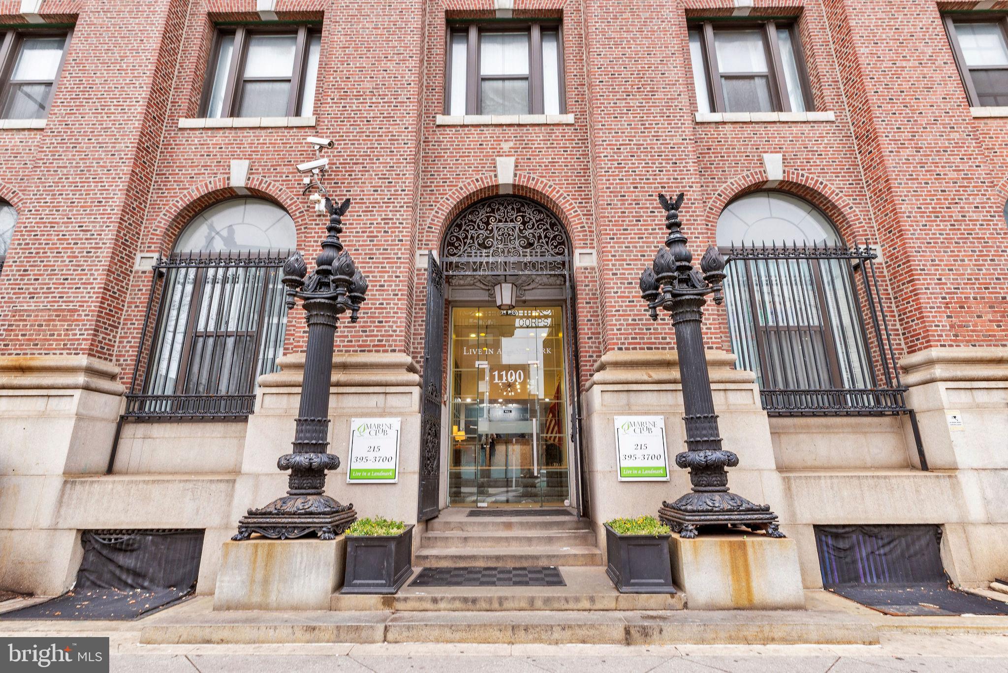 a front view of a house with many windows