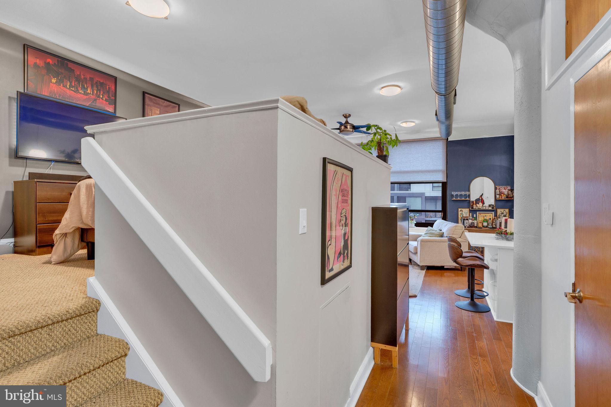 1100 South Broad Street, Unit 607B Philadelphia, PA 19146 - Photo 9 of 18 a view of living room with furniture and wooden floor