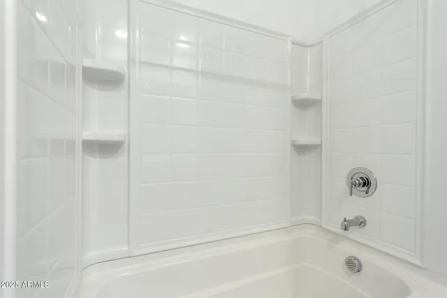 a bathroom with a bathtub