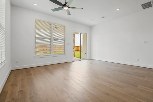 a view of cabinets and window