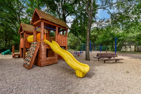 a view of a park with slide