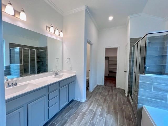 4826 Albany Ridge Lane Rosharon, TX 77583 - Photo 34 of 37 a spacious bathroom with a double vanity sink a large mirror and shower